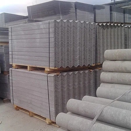 Волнистый шифер и асбестоцементные трубы.