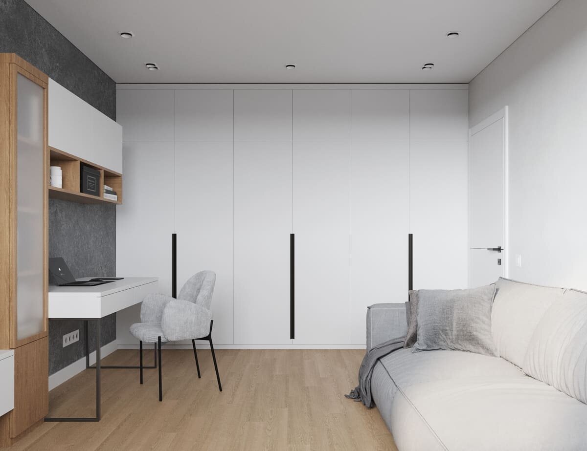 Обратите внимание, как цвет ручек шкафа перекликается с ножками стола и стула, благодаря такой "рифмовке" черные детали выглядят гармонично, а не бросаются в глаза