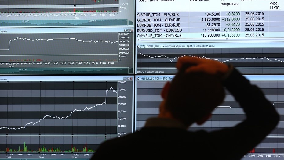    Обстановка в офисе Московской биржи во время торгов. Автор фото: Сергей Фадеичев/ТАСС