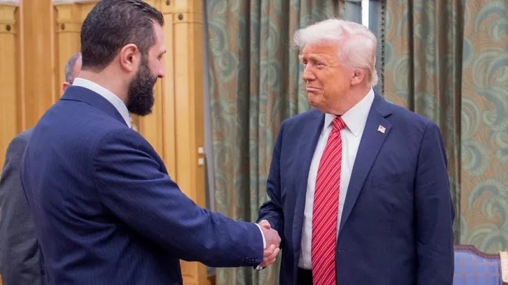    Трамп и Ал-Джулани (скрин с видео телеканала Al Jazeera).