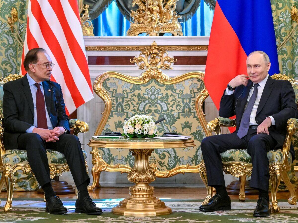    Президент России Владимир Путин и премьер-министр Малайзии Анвар Ибрагим во время встречи© РИА Новости / Кристина Кормилицына