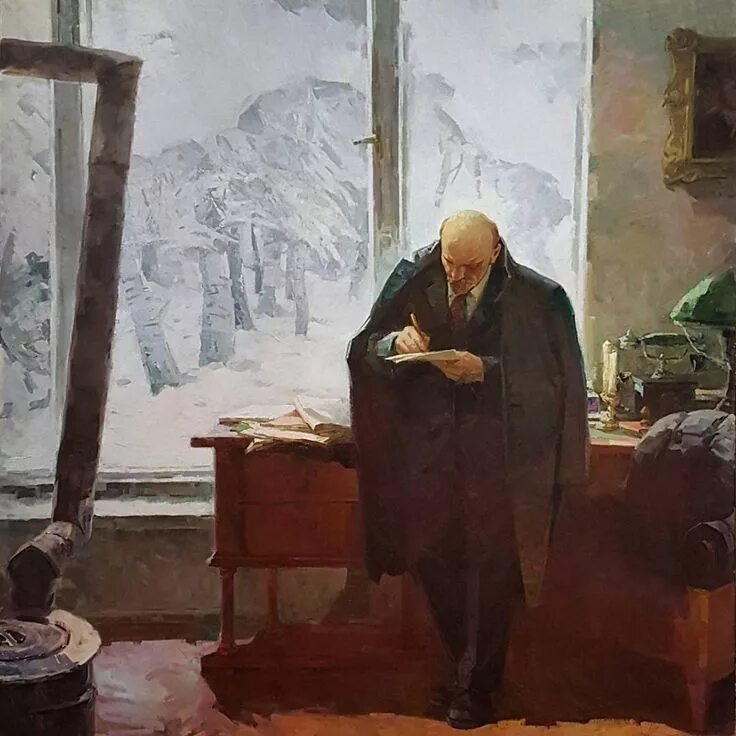 Ленин что-то записывает 