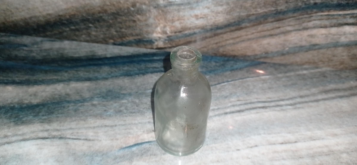 Пузырёк от аптечной микстуры