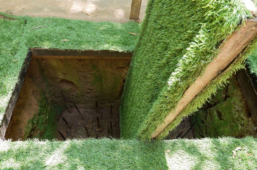 На фотографии показана одна из ловушек, установленных на территории туннелей Ку Чи