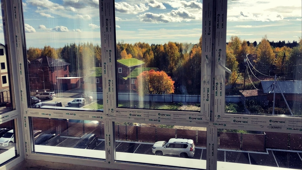 Остекление углового балкона профильной системой ORTEX Optima Design