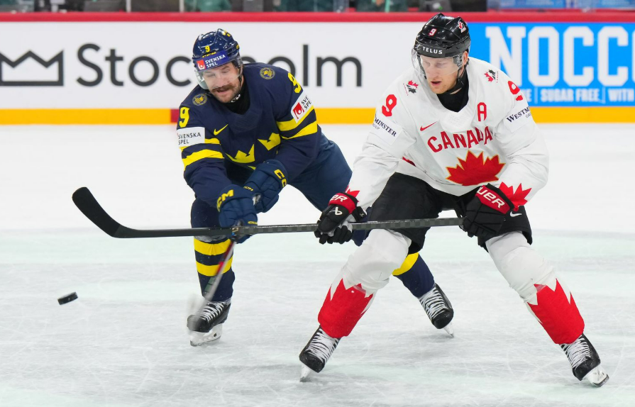 Канадцы заняли первое место в группе А, шведы - второе. Фото: ИИХФ