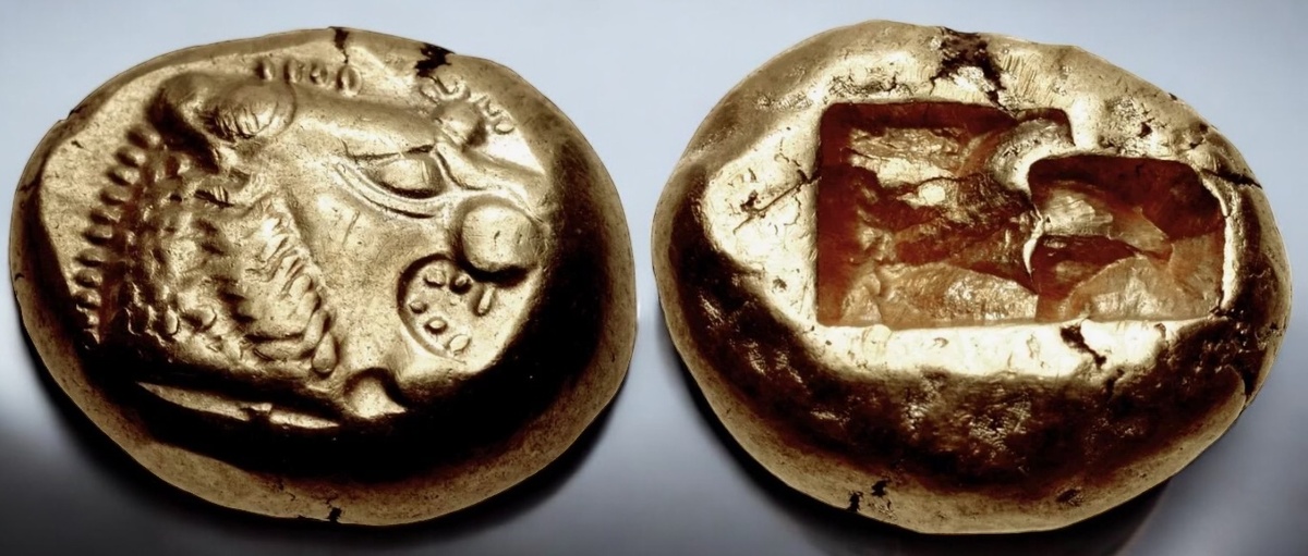 Лидия. 620–550 годы до н. э. Третий статер (12,5 мм, 4,73 г). Монетный двор в Сардах. Голова льва и солнце с лучами. Два вдавленных квадрата.