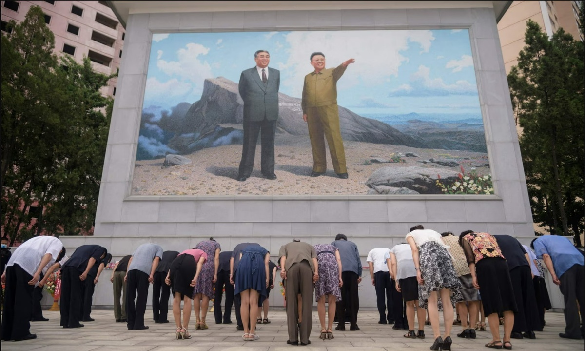 Граждане Северной Кореи. Источник: Kim Won Jin/AFP/Getty Images