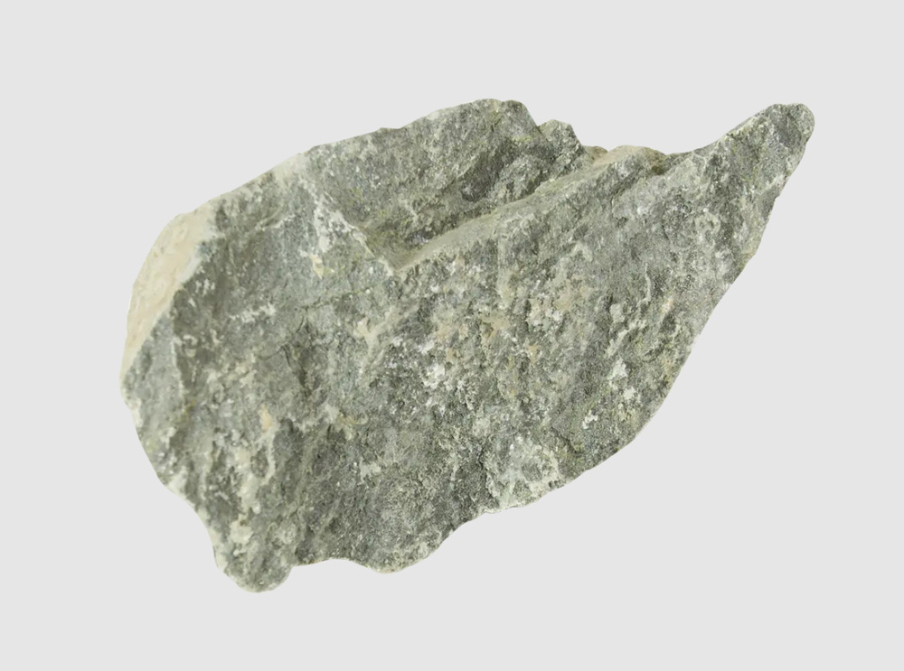 Дунит получил свое название в 1859 в Новой Зеландии. Именно там на горе Dun Mountain он был впервые идентифицирован. Фото mf.bmstu.ru.