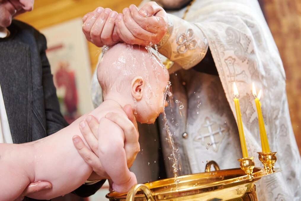 [caption id="attachment_152696" align="alignnone" width="1016"] Christening religious sacrament[/caption]