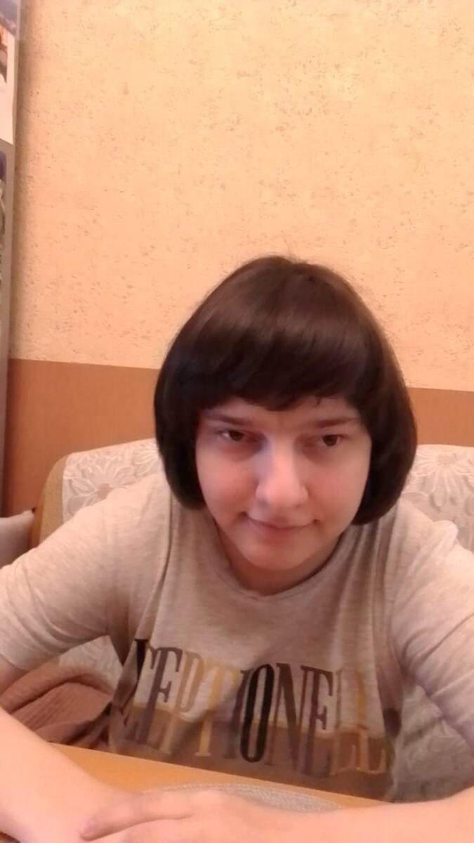 Я ещё со старой стрижкой. 