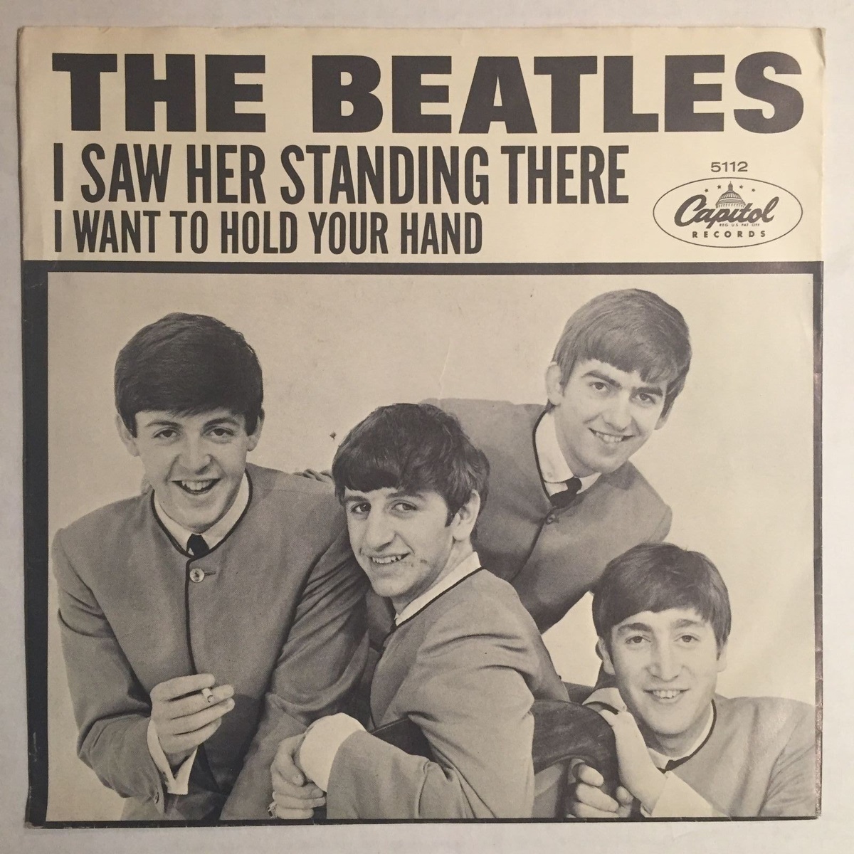 Оригинальная обложка американского сингла «I Want To Hold Your Hand» / «I Saw Her Standing There» от фирмы «Capitol Records».