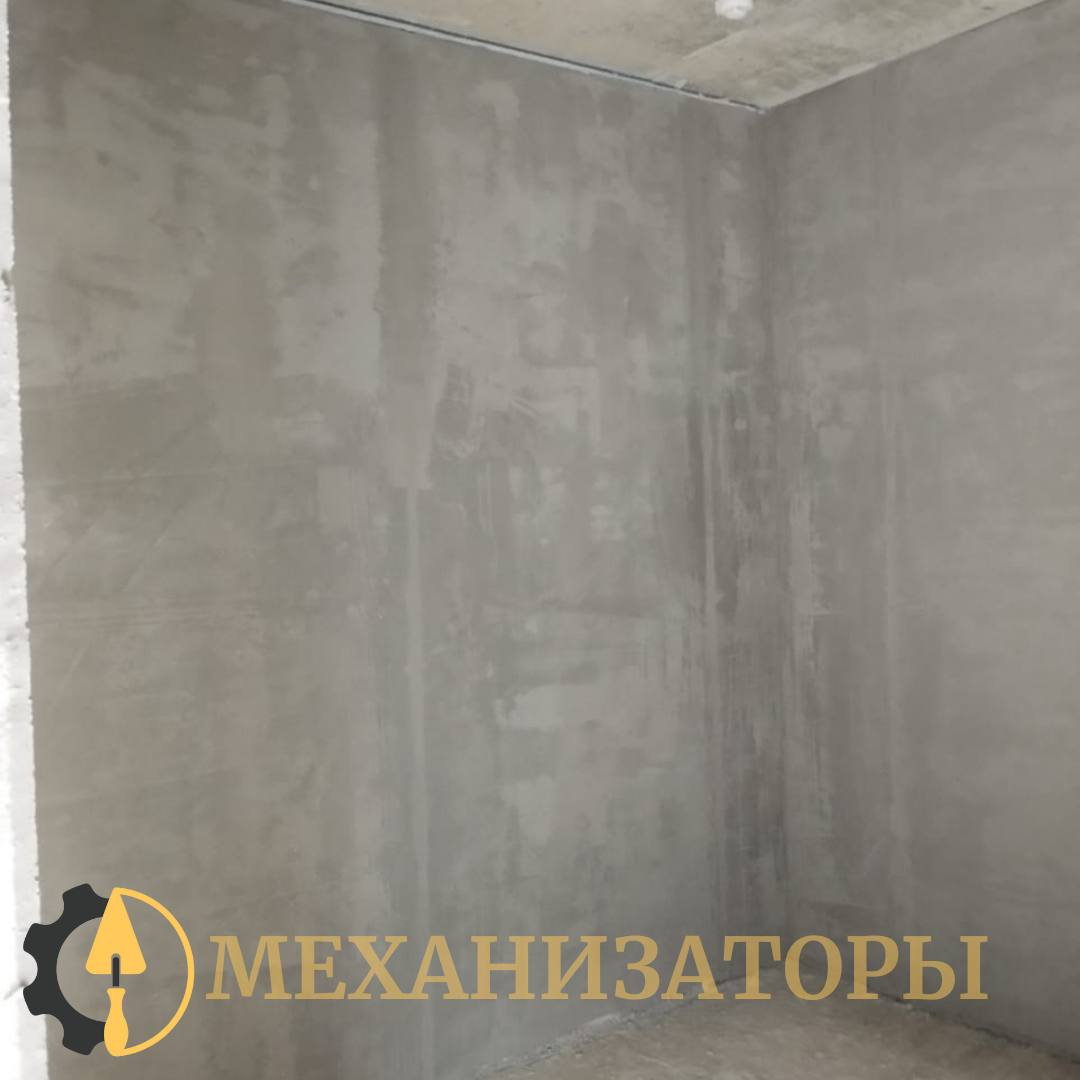 На фото: свежая механизированная штукатурка