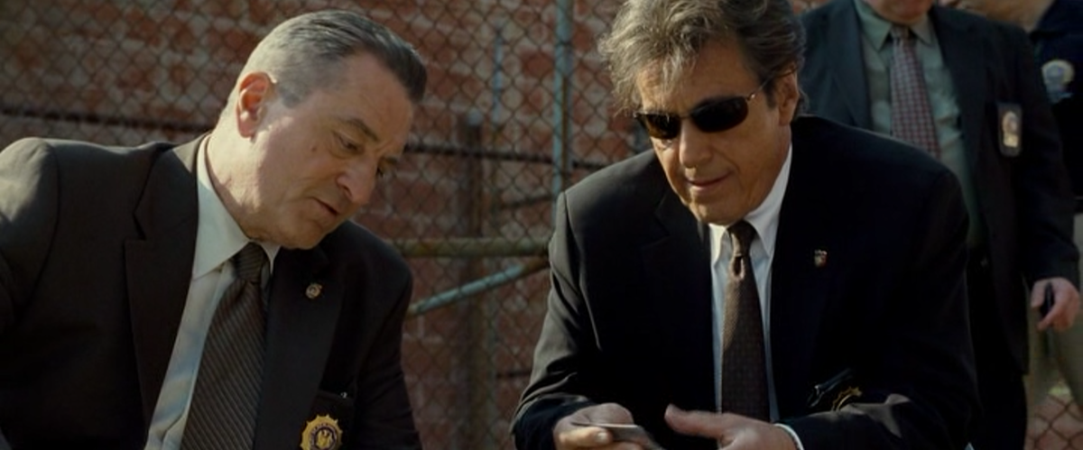 детектив Кован (в исполнении Роберта Де Ниро) и детектив Фиск (в исполнении Аль Пачино)