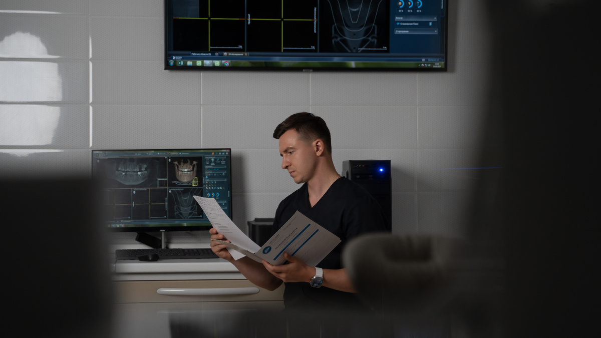 Сколько по времени вытягивается ретенированный зуб брекетами?