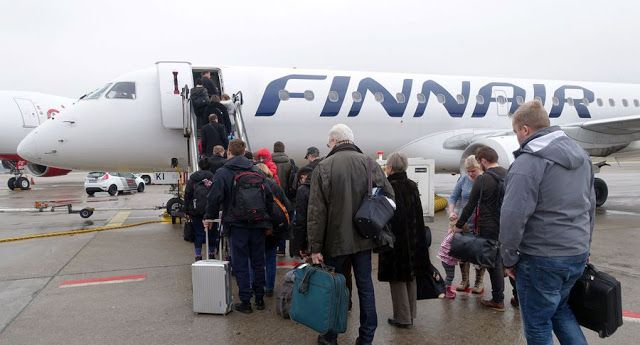 Посадка пассажиров на рейс авиакомпании Finnair