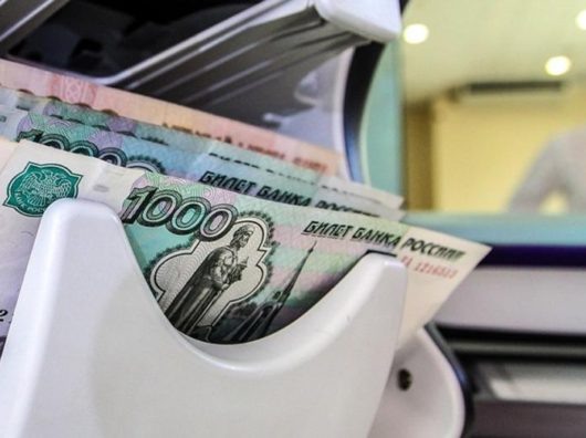    Деньги в счетной машинке //Фото Екатерина Кузьмина / РБК