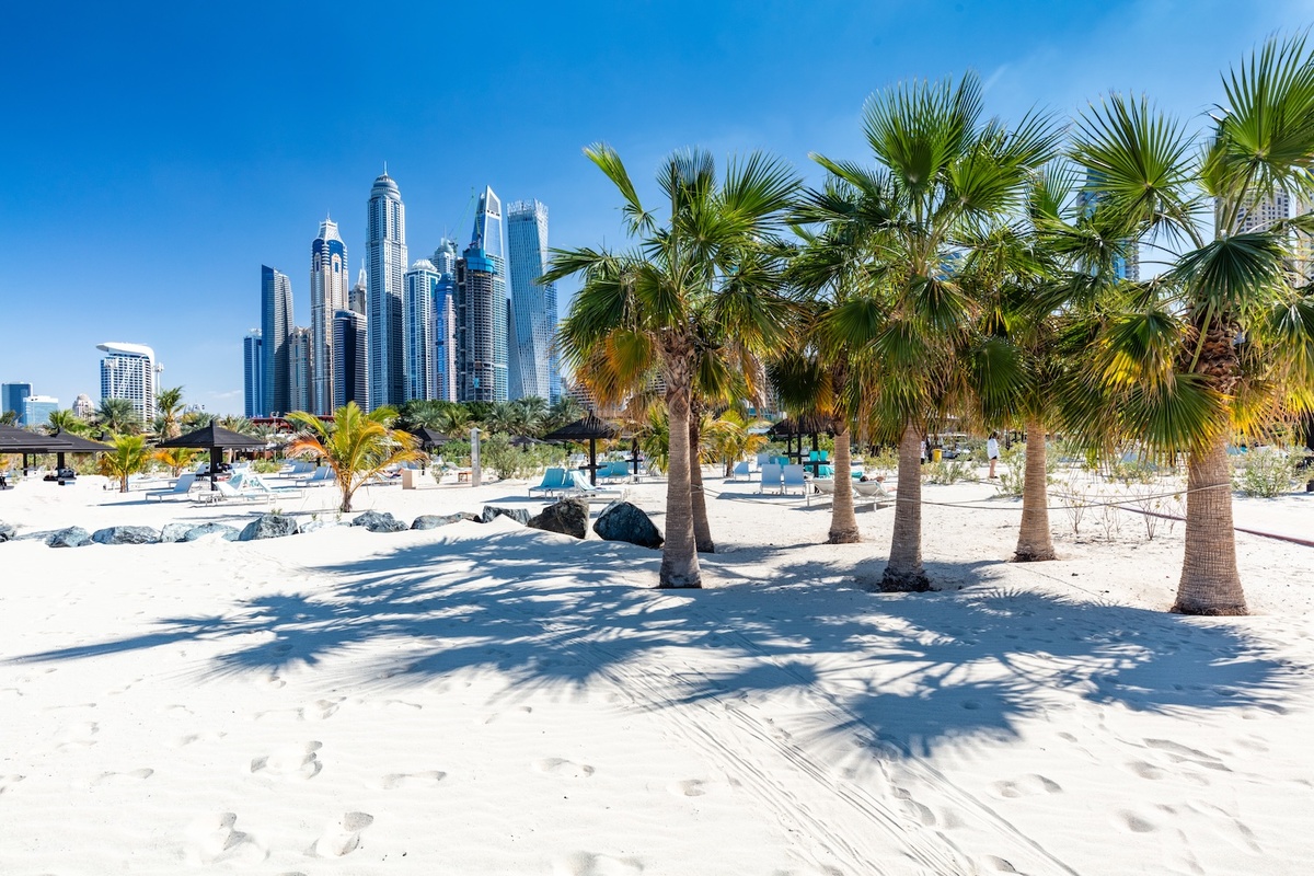 https://theblackboats.com/wp-content/uploads/dubai-jumeirah-beach-with-marina-skyscrapers-in-ua-2023-11-27-05-20-10-utc.jpg