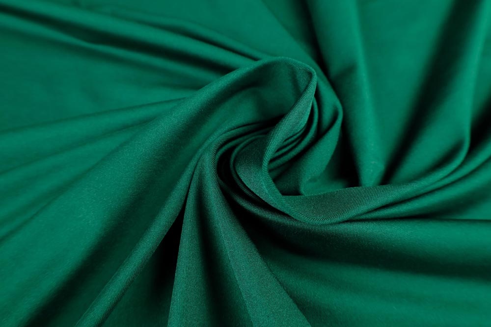 Ткань трикотаж масло зеленого цвета