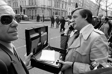 Переносной телефон. 