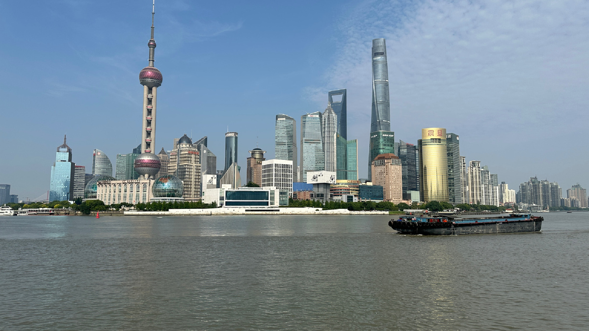 Вантань, набережная, которую стоит посетить, с нее открывается вид на финансовый центр. 