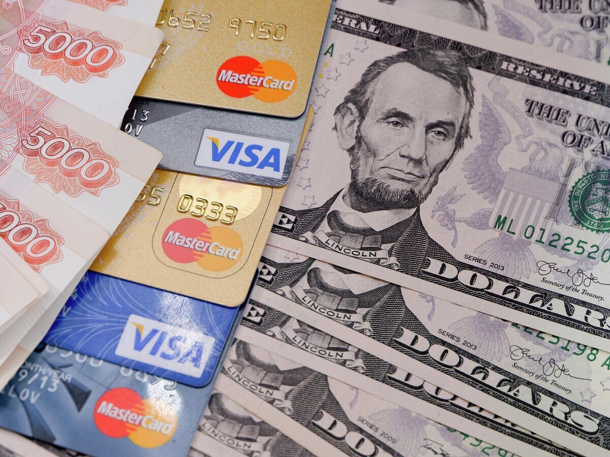    Денежные купюры России и США© РИА Новости / Владимир Трефилов