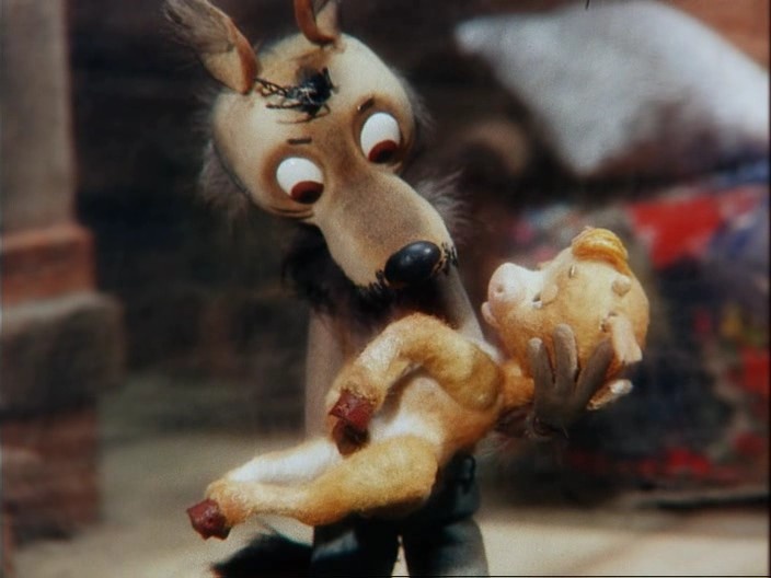 У волка явно обнаружились отцовские чувства. Фото Яндекс.Картинки. 