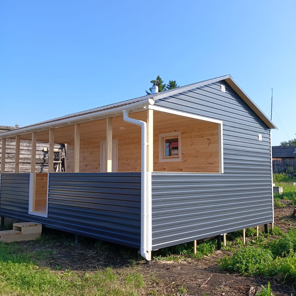 Баня с террасой размерами 4,4 м * 6 м
