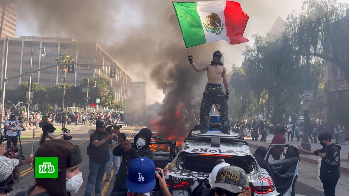    Охваченный беспорядками    Лос-Анджелес    напоминает зону боевых действий