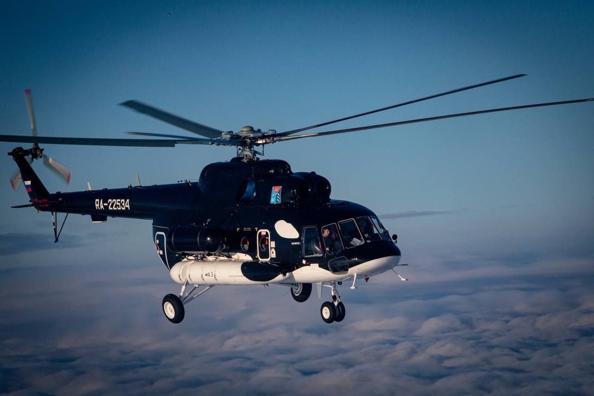 Фото: Магаданский вертолет Ми-8МТВ-1 в образе косатки