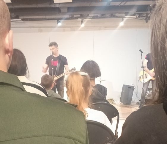 Фото сына с концерта.