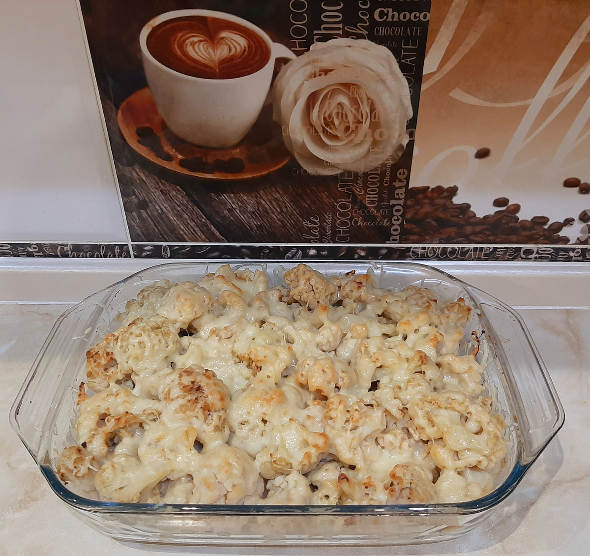 Цветная капуста с яйцом и сыром приготовленная в духовке.