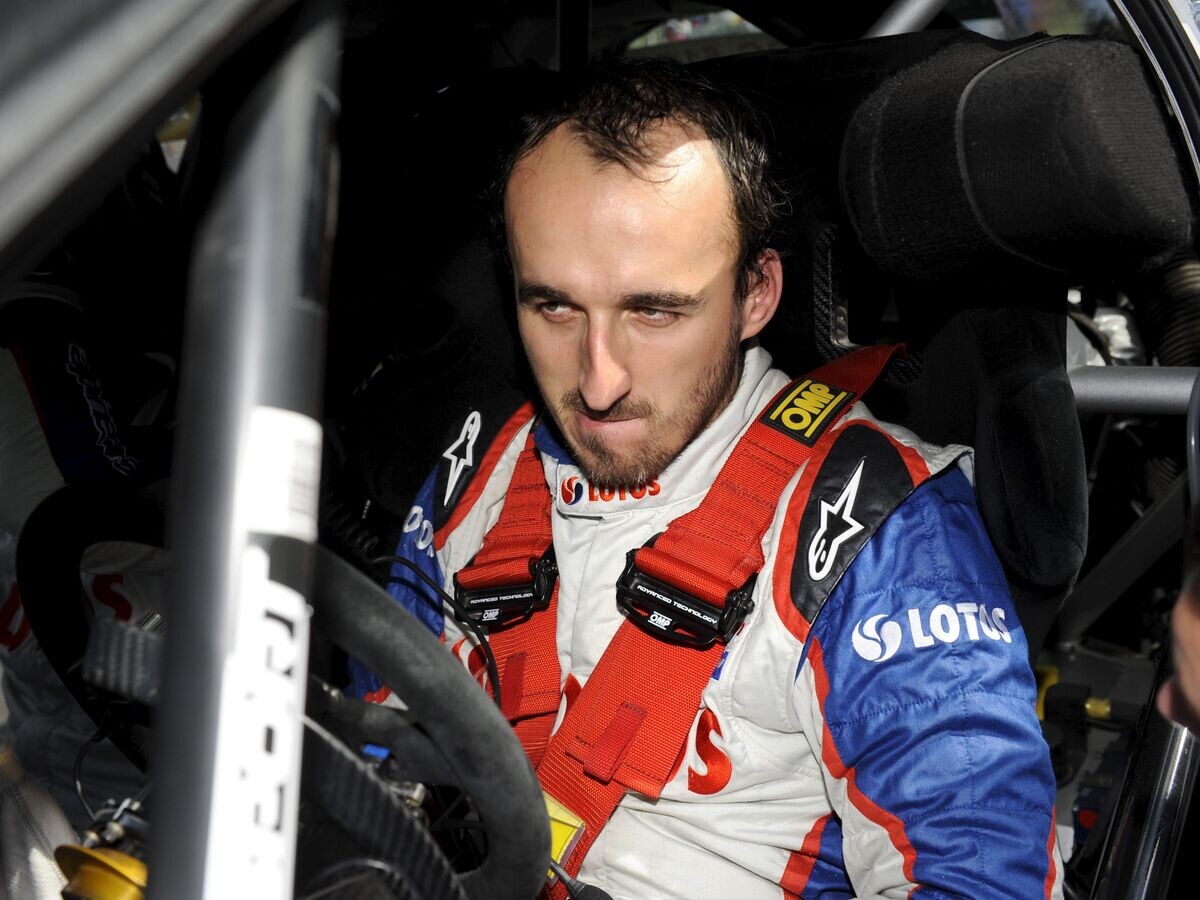    Польский автогонщик Роберт Кубица© AP Photo / Mikko Stig