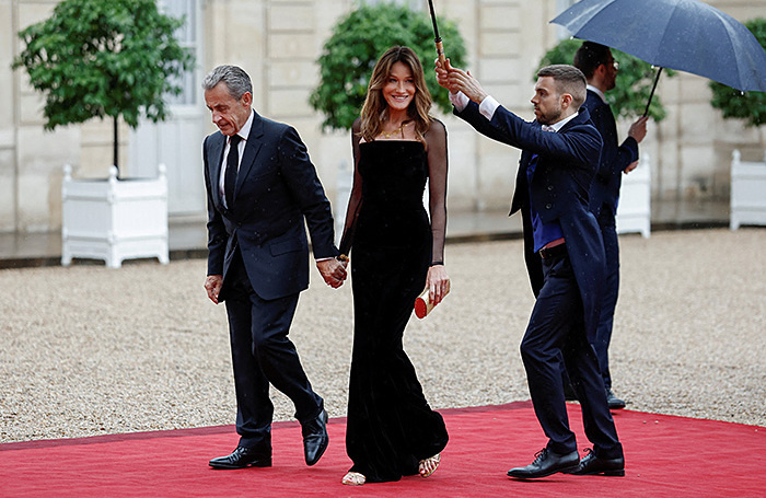    Николя Саркози с супругой Карлой Бруни-Саркози.REUTERS/Benoit Tessier
