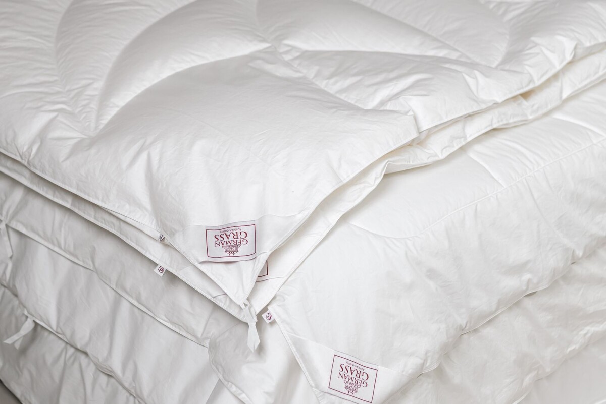 В ассортименте German Grass  есть одеяла и пододеяльники с особой системой креплений, обеспечивающей надежную фиксацию одеяла внутри и легкую смену постельного белья