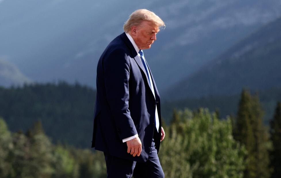 © Suzanne Plunkett/ Pool Photo via AP