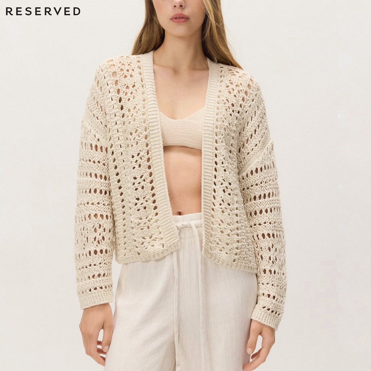 Бежевый кардиган с комбинацией узоров