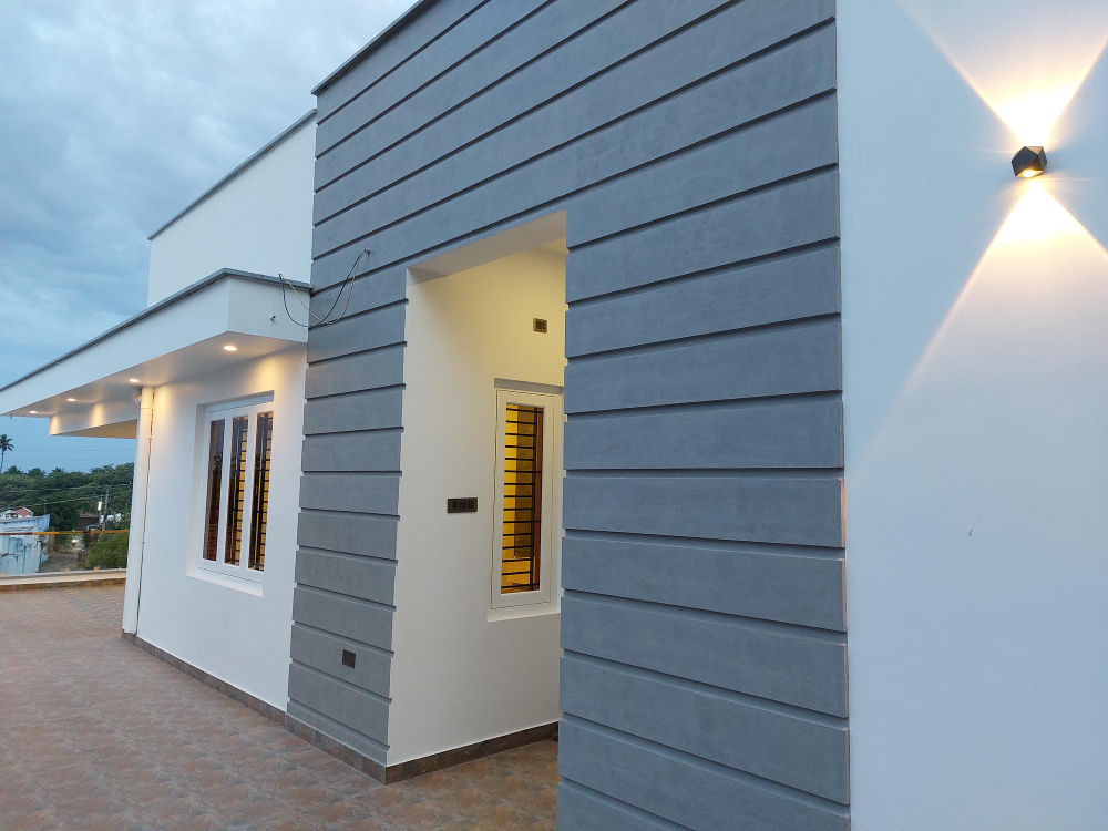 Дом, отделанный фиброцементным сайдингом