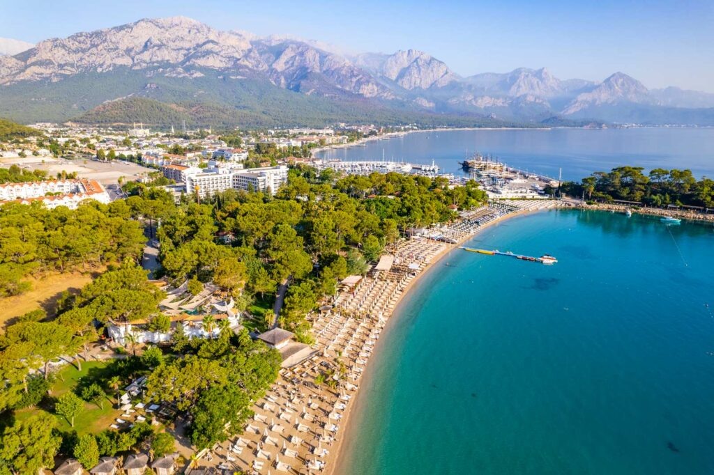      Kemer, Antalya, Turkey. Aerial view of Moonlight Beach in Kemer. Beautiful turquoise colors of Mediterranean sea. Drone shot. tourist