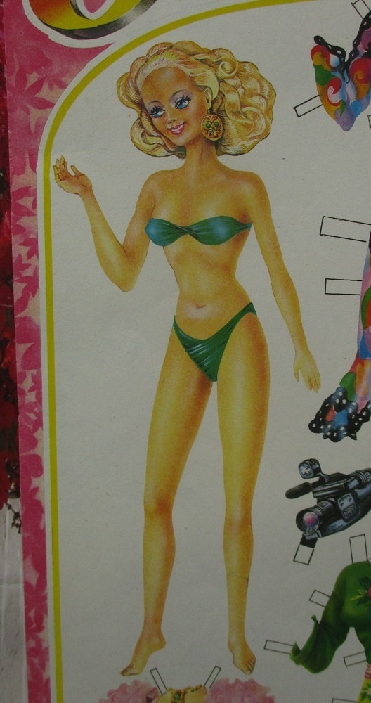 Кукла в купальнике.