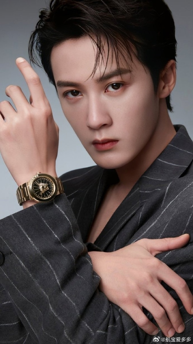 Тань Цзянь Цы 