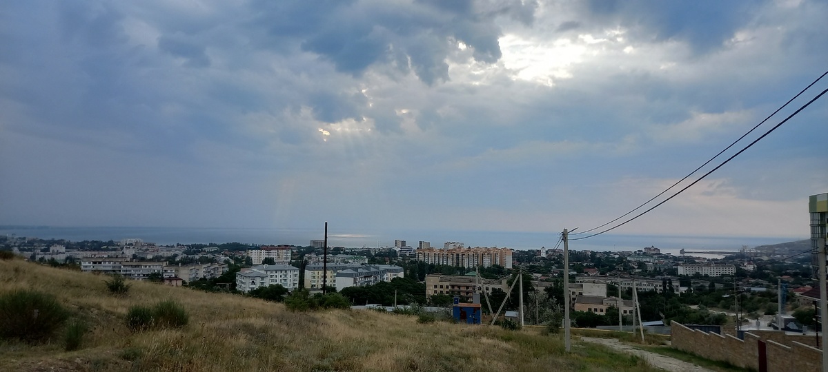 Восход  солнца над городом