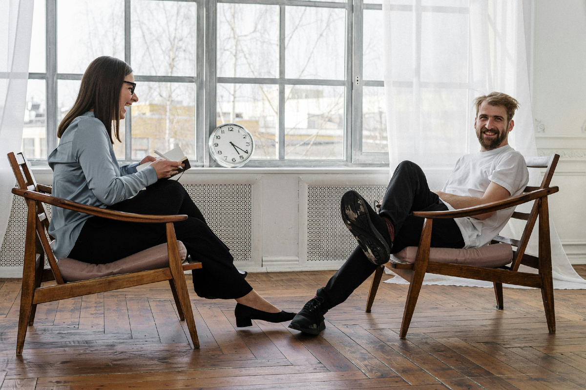 Photo by cottonbro studio: https://www.pexels.com/photo/2-women-sitting-on-brown-wooden-chair-4101137