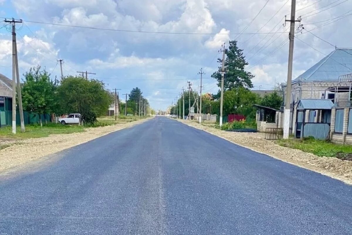    В ауле Кошехабль продолжается реконструкция автодороги по улице Совмена