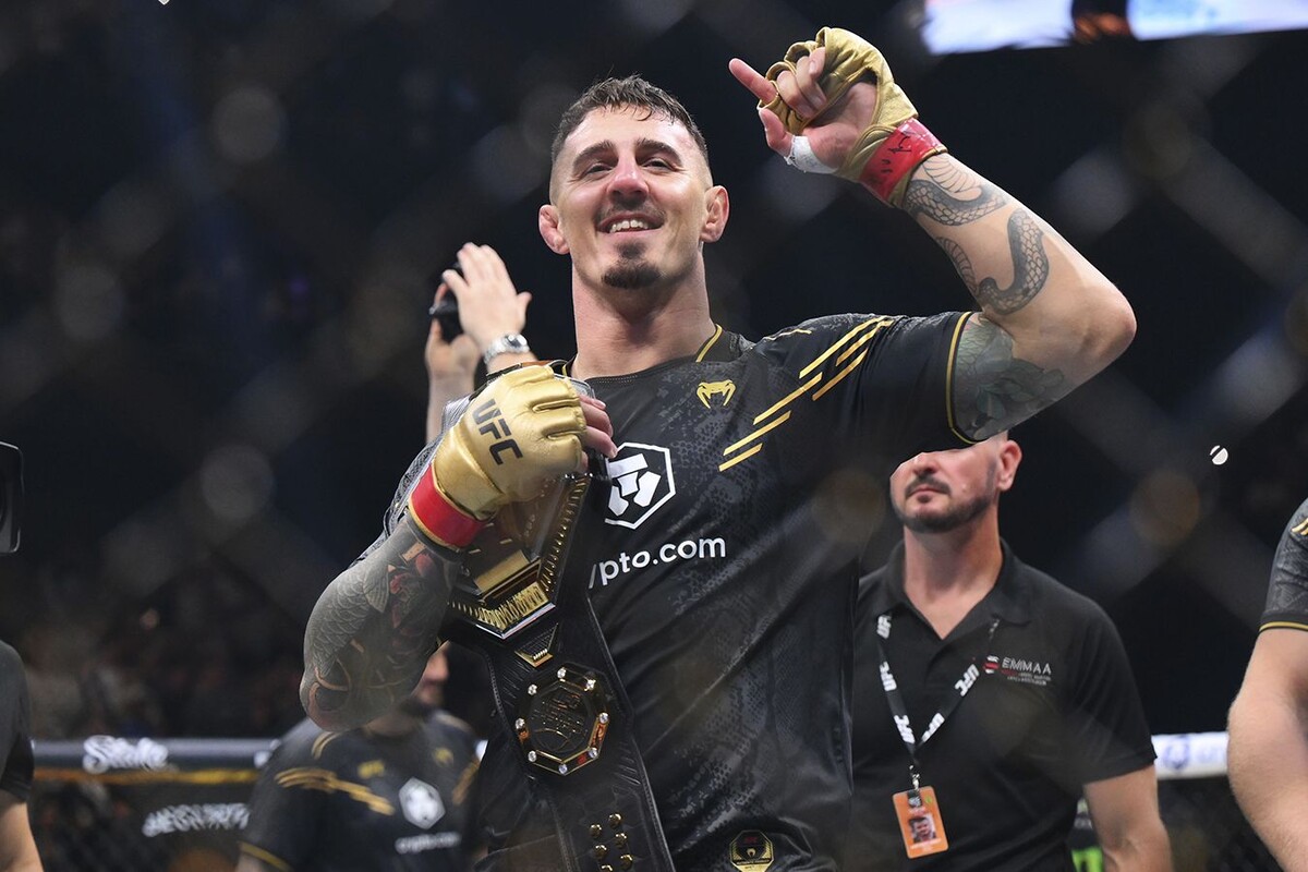 Том Аспиналл