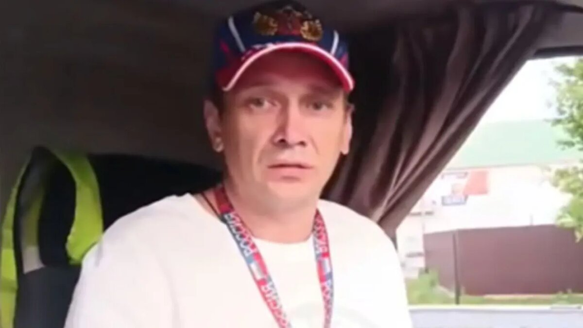    Дальнобойщика на рынке блокировали мигранты. Скрин "Русская община"