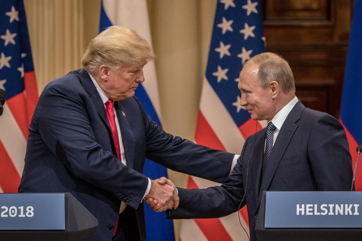 President Trump and Russian President Vladimir Putin shake hands during a joint press conference after their summit on July 16, 2018, in Helsinki, Finland.
Getty Images