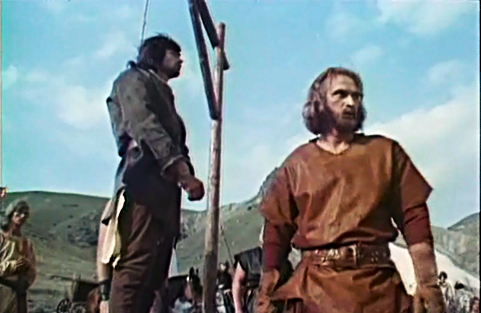 Киноэкранный образ Ричарда Львиное Сердце. Кадры из фильма «Рыцарь Кеннет» (1993 год; производство – Россия. Режиссёр – Евгений Владимирович Герасимов. Автор сценария – Мария Калинина). В роли Ричарда I – российский актёр Александр Николаевич Балуев. Забегая вперёд, автор данного цикла публикаций скормно высказывает своё мнение о том, что Александр Балуев создал один из наиболее ярких, харизматичных, убедительных и запоминающихся кинематографических образов выдающегося английского короля-крестоносца