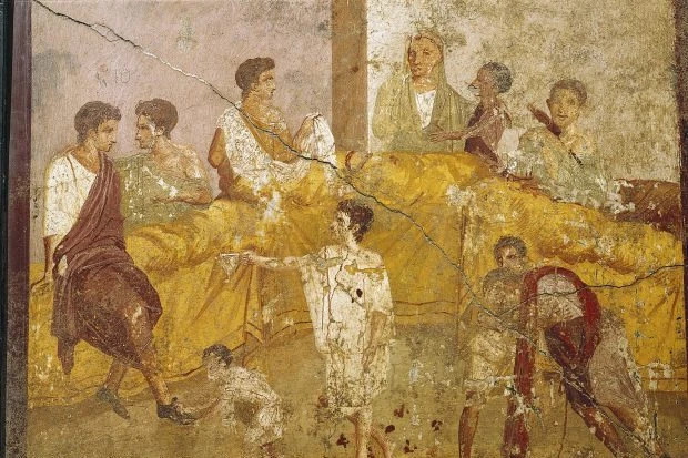 На этой фреске 1-го века нашей эры из Помпей запечатлен оживленный римский банкет, дающий представление о общественной жизни города до его разрушения в 79 году нашей эры.