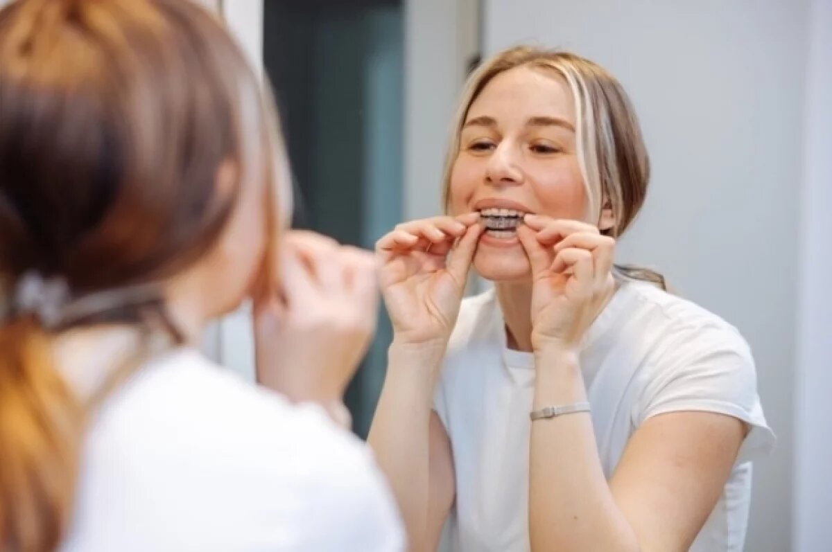    Зубы в оковах.